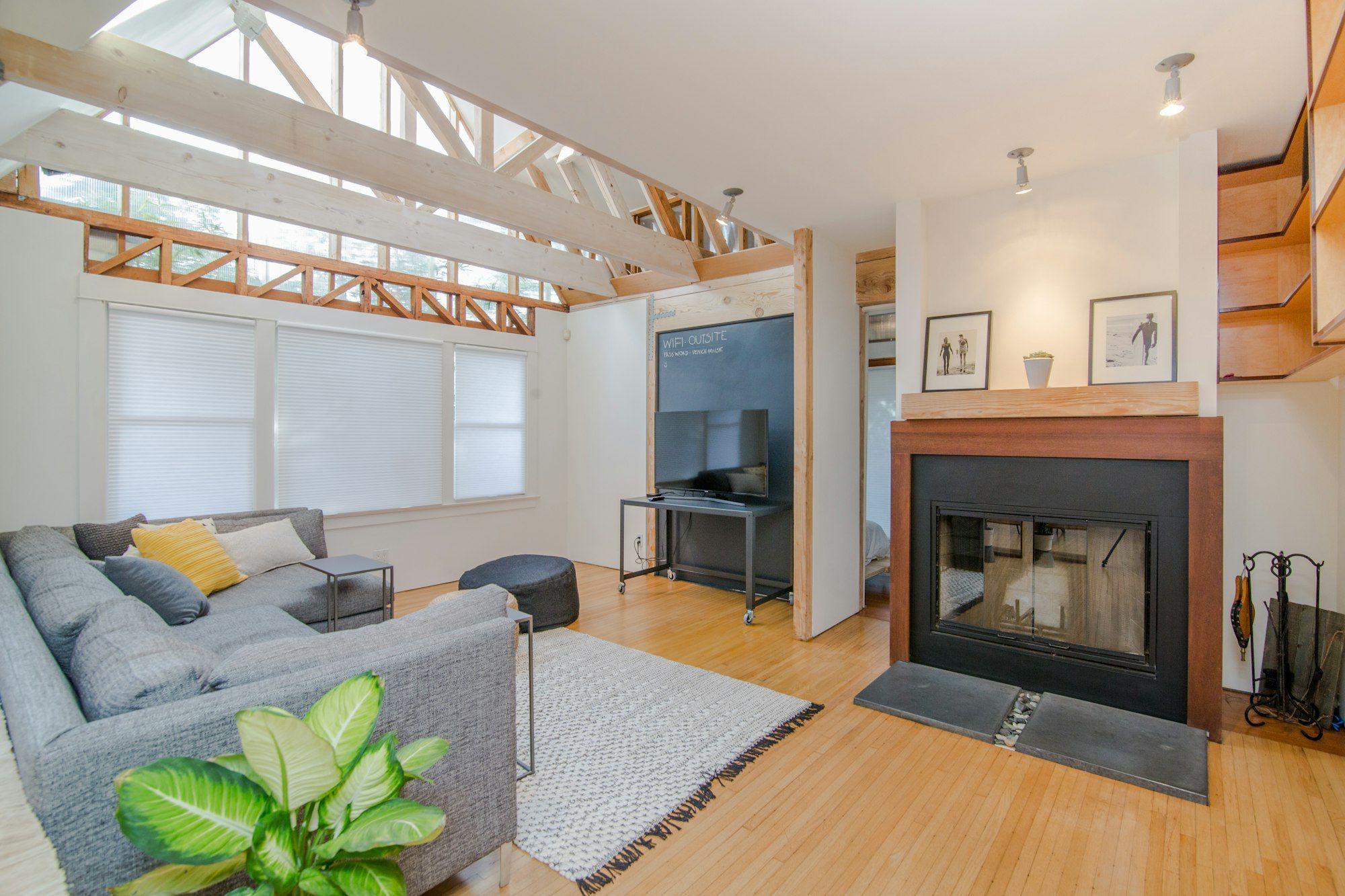 Living room with a fireplace in David's Glen Allen home