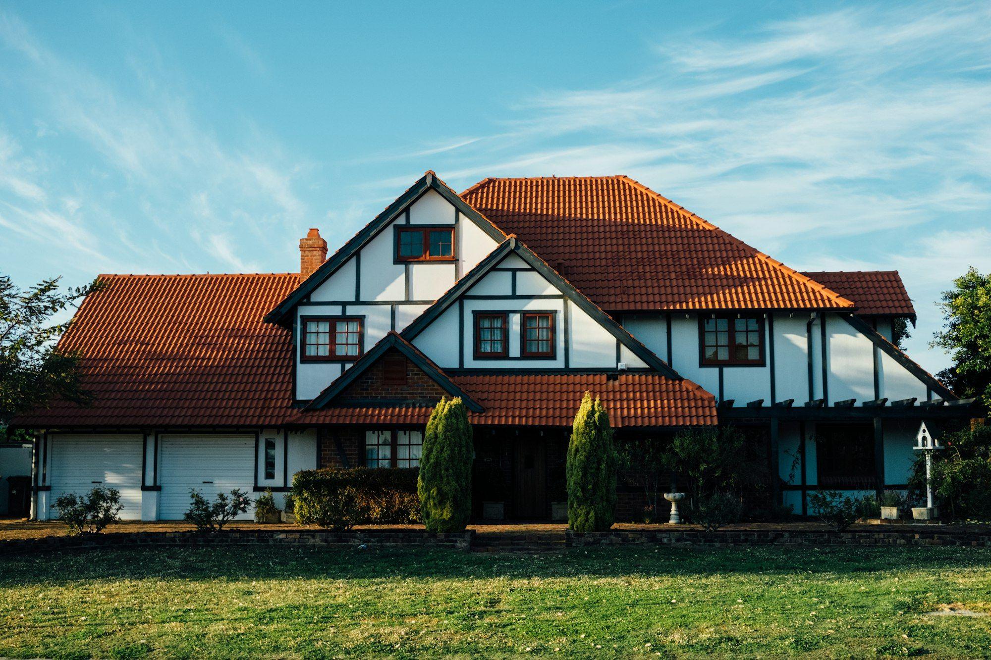 Tudor-style home with a large lawn in Hanover